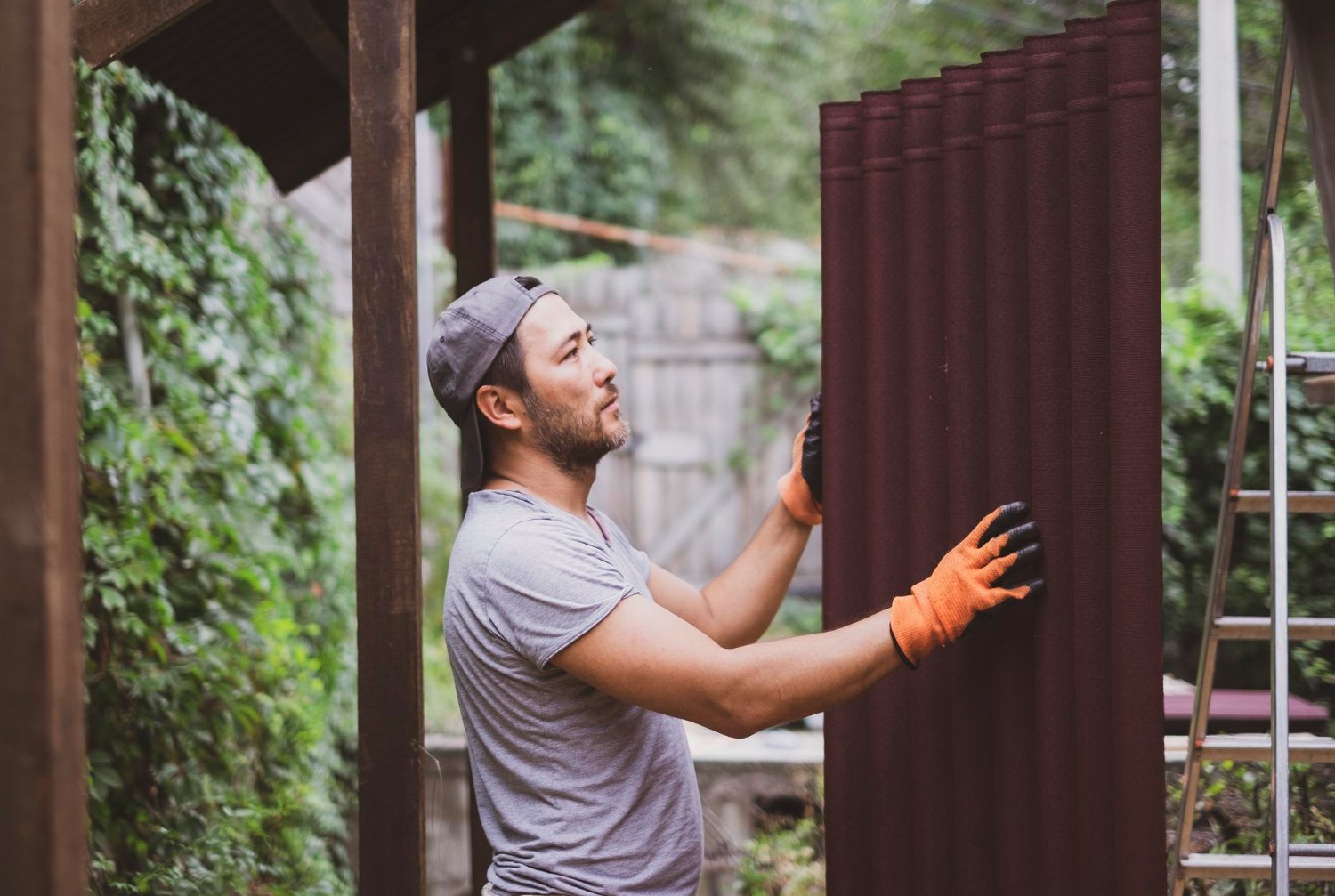 Man installing panels and screens